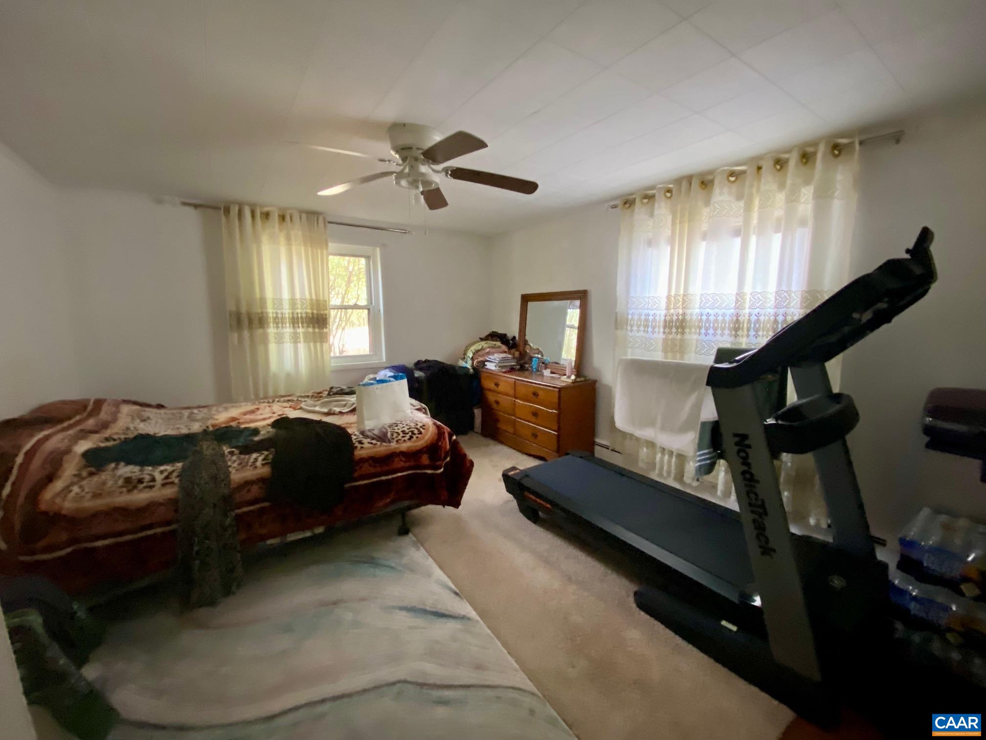 115 Apple Tree Road Charlottesville, VA 22903 - Photo 15 of 17 a bedroom with furniture