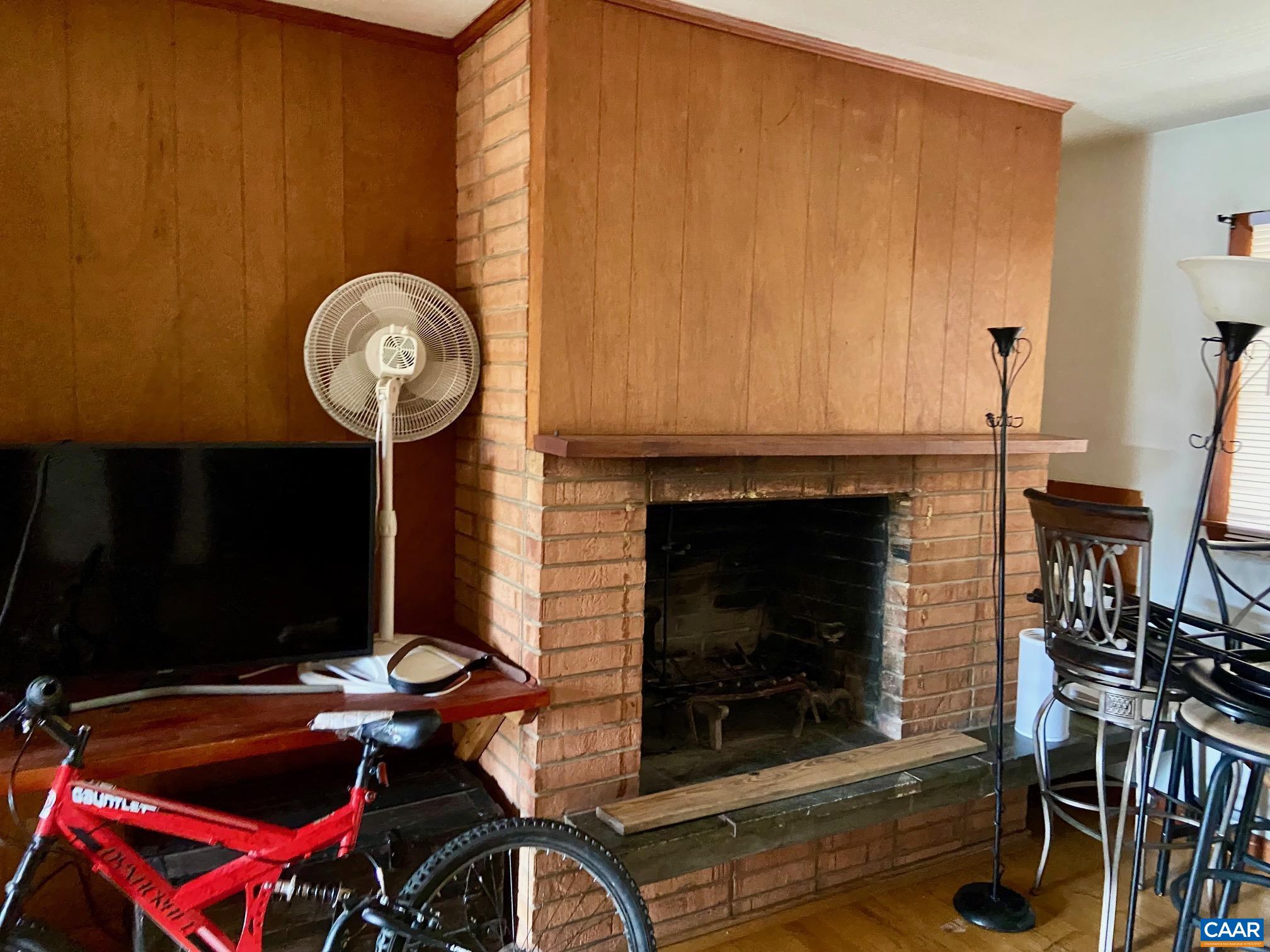 115 Apple Tree Road Charlottesville, VA 22903 - Photo 3 of 17 a room with furniture and a fireplace