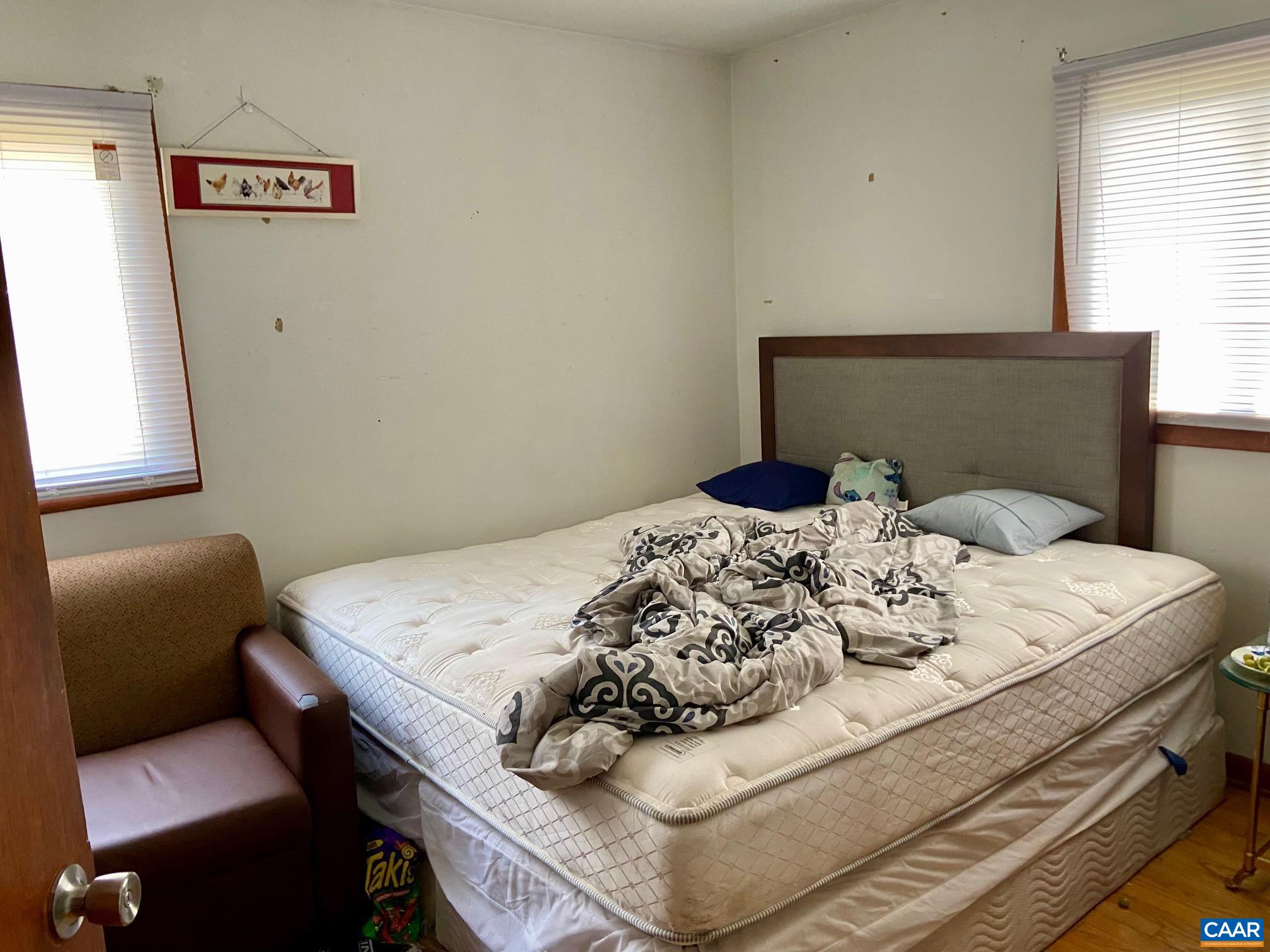 115 Apple Tree Road Charlottesville, VA 22903 - Photo 6 of 17 a bedroom with a bed and dresser