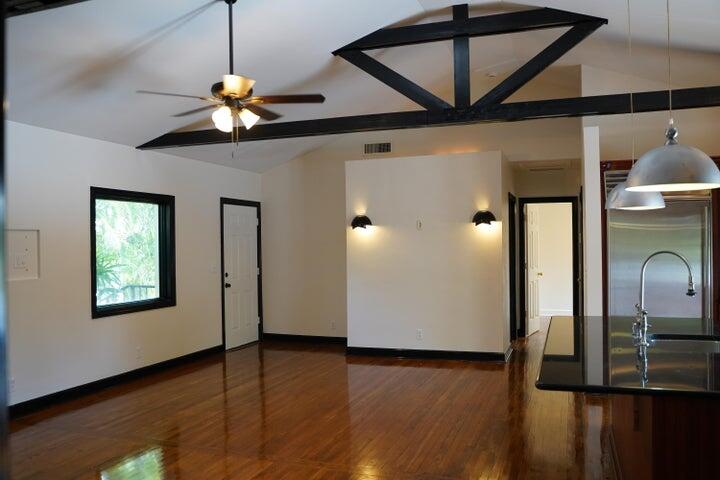 5215 North Flagler Drive West Palm Beach, FL 33407 - Photo 11 of 37 a view of an entryway with wooden floor