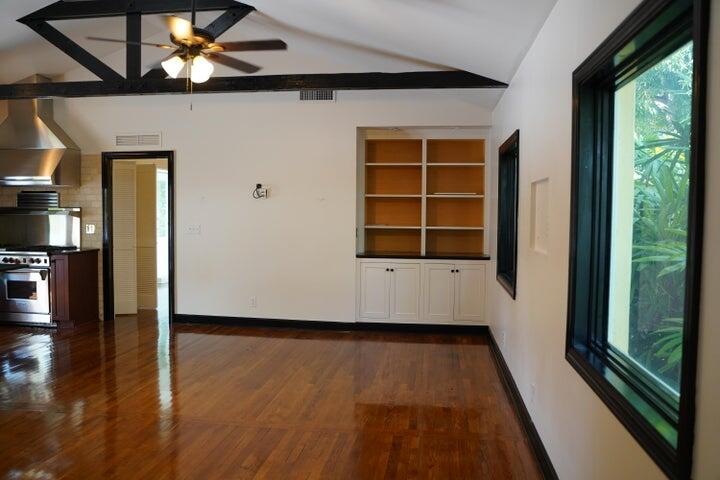 5215 North Flagler Drive West Palm Beach, FL 33407 - Photo 13 of 37 a view of empty room with wooden floor and fan