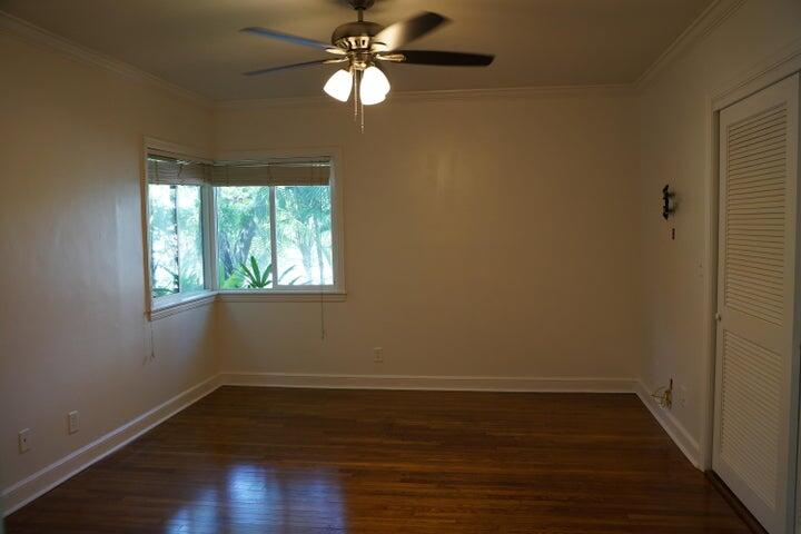 5215 North Flagler Drive West Palm Beach, FL 33407 - Photo 18 of 37 a view of a room with wooden floor and a window
