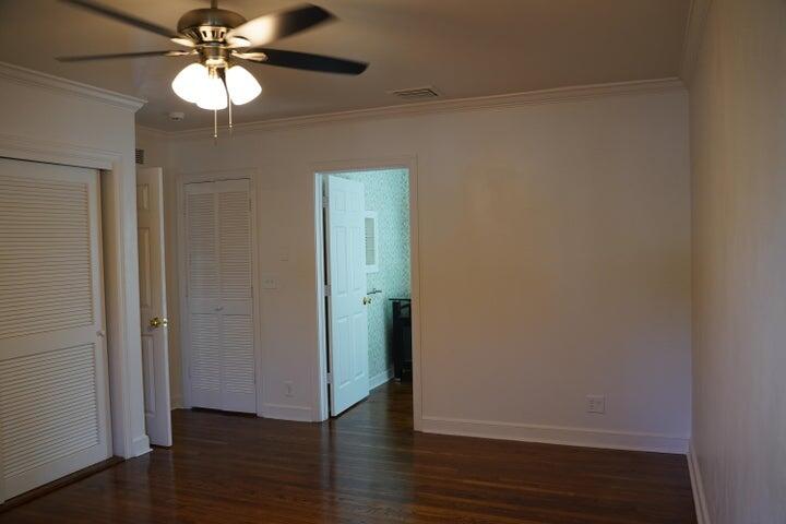 5215 North Flagler Drive West Palm Beach, FL 33407 - Photo 19 of 37 a view of an empty room with wooden floor