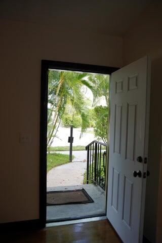 5215 North Flagler Drive West Palm Beach, FL 33407 - Photo 10 of 37 a view of porch with a small yard