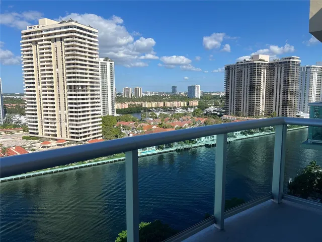 a view of a lake from a balcony