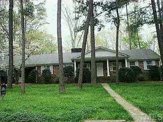 601 Sampson Street Raleigh, NC 27609 - Photo 1 of 1 a backyard of a house with lots of green space
