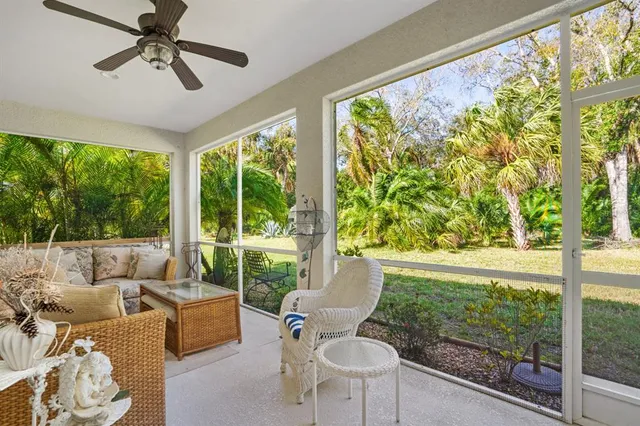 a living room with large windows