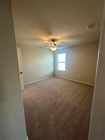 a bathroom with a double vanity sink and mirror