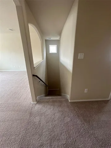 a bathroom with a double vanity sink mirror and shower