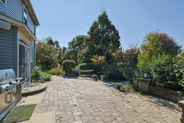 a view of a chairs and tables in the patio