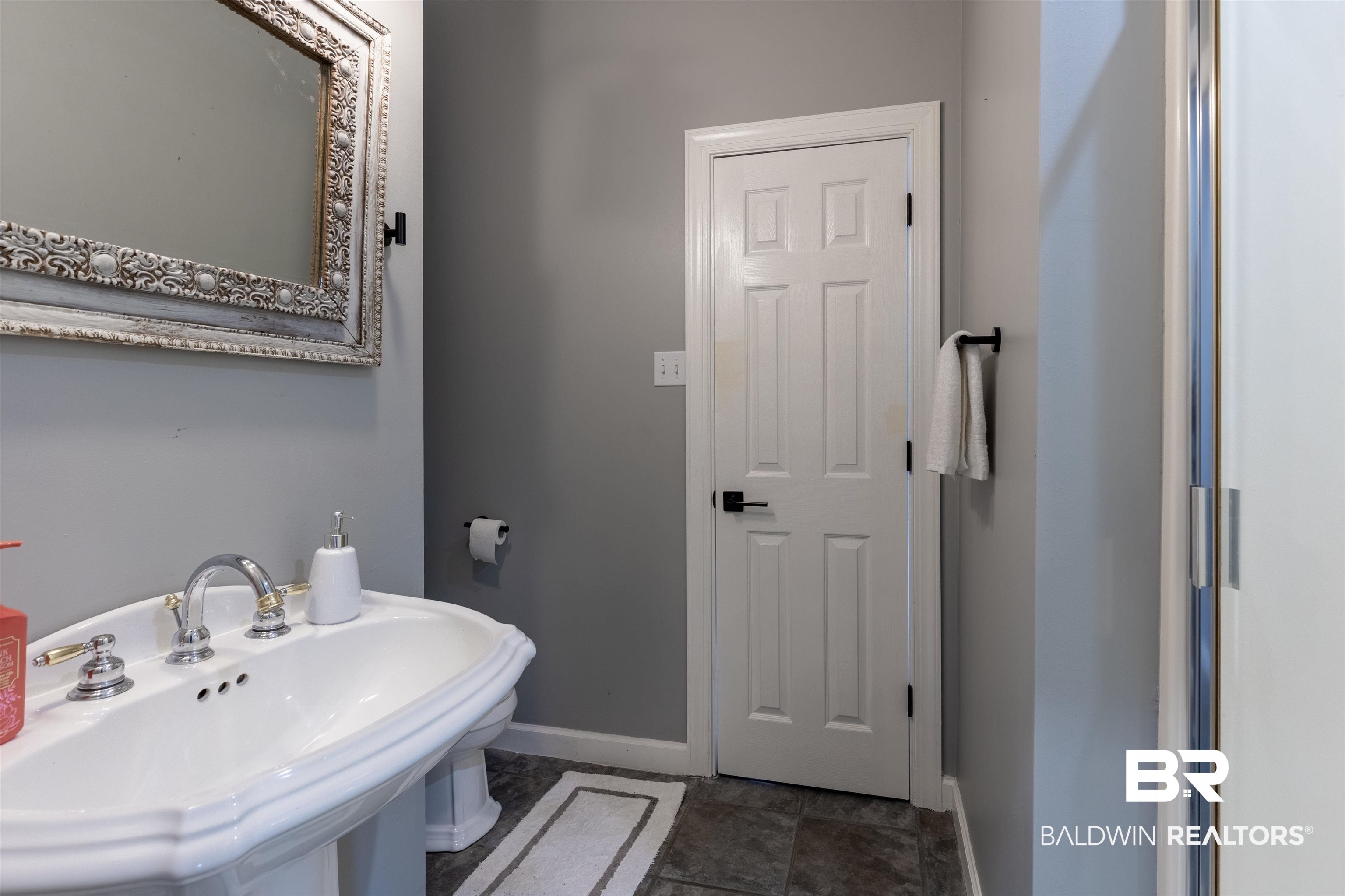6436 Cherry Ridge Court West Mobile, AL 36695 - Photo 7 of 26 Bathroom featuring baseboards and a sink