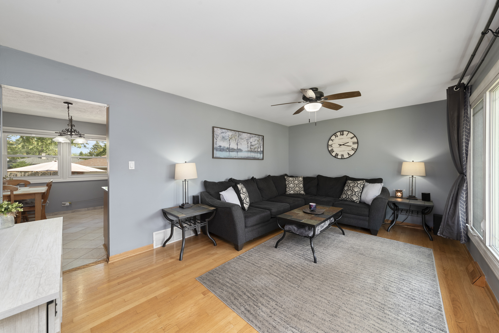 943 Sumner Street Addison, IL 60101 - Photo 6 of 20 a living room with furniture and a window