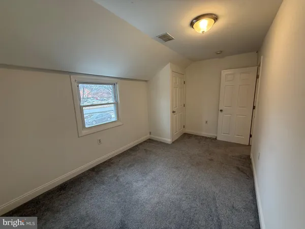 a view of entryway with a wooden floor