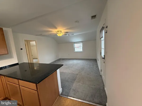 a view of a kitchen cabinets a sink and dishwasher