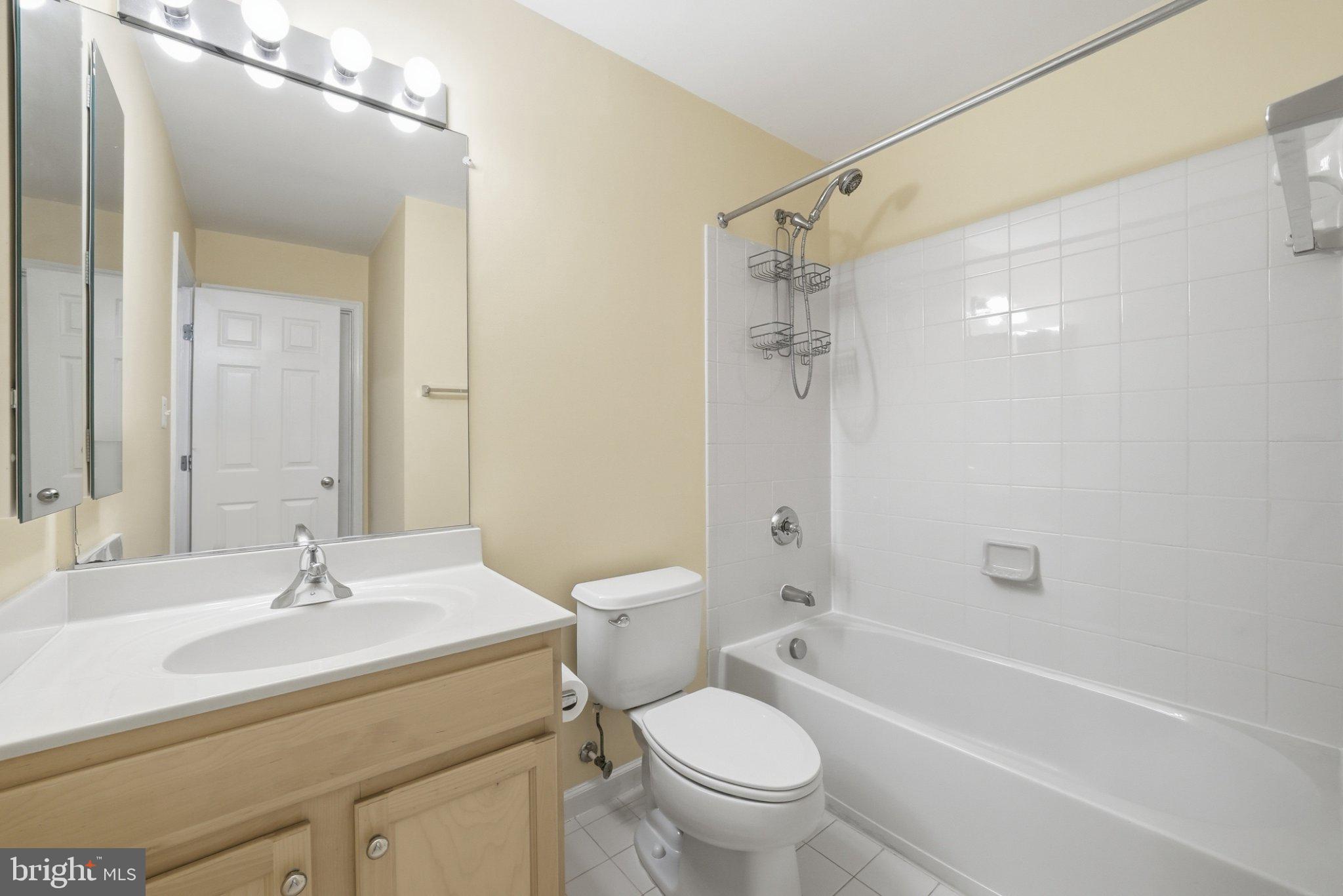 3679 Expedition Drive Triangle, VA 22172 - Photo 23 of 65 a bathroom with a sink toilet and shower