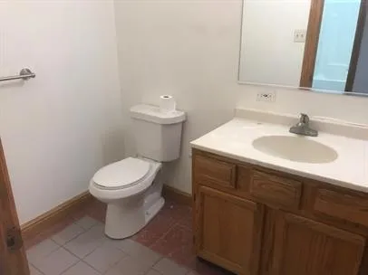 a bathroom with a sink and a toilet