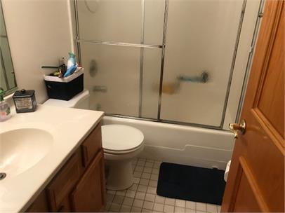 4219 South Union Avenue, Unit 2 Chicago, IL 60609 - Photo 25 of 25 a bathroom with a sink a toilet and shower