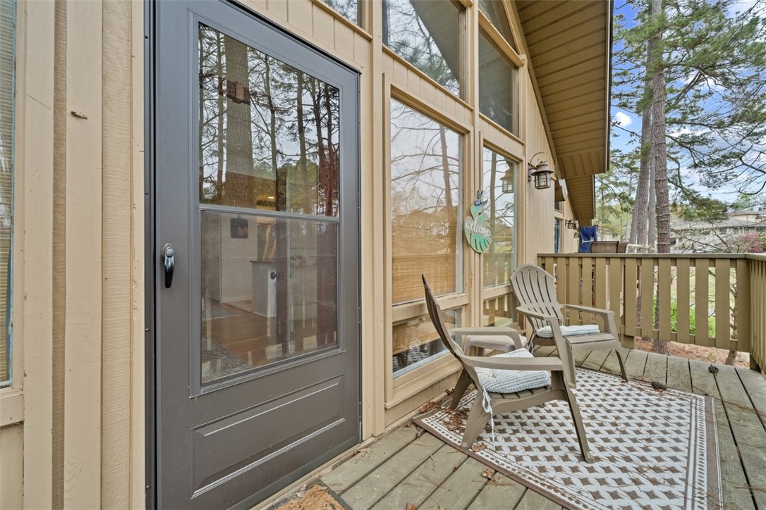 560 South Flagship Drive, Unit 6 Salem, SC 29676 - Photo 12 of 14 This inviting patio area features durable wood construction, perfect for outdoor relaxation.
