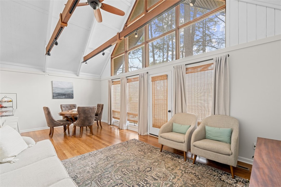 560 South Flagship Drive, Unit 6 Salem, SC 29676 - Photo 7 of 14 This airy living space features soaring vaulted ceilings and expansive windows that invite abundant natural light.