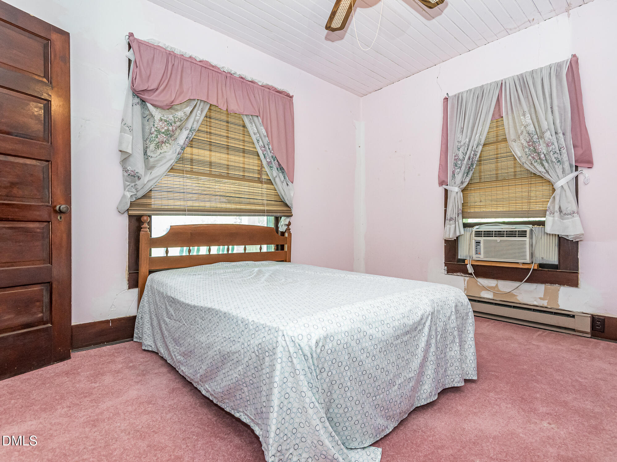 381 Royal Road Roseboro, NC 28382 - Photo 19 of 30 a bedroom with a bed and a window