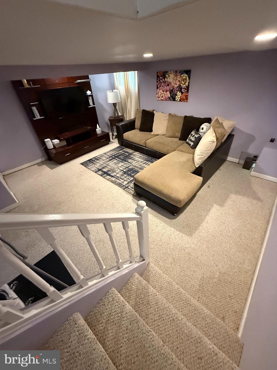 2235 Hawthorne Road Baltimore, MD 21220 - Photo 21 of 35 a living room with furniture and a couch