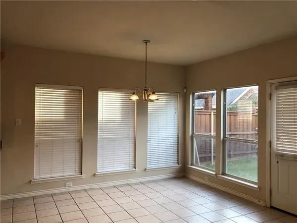 a view of a room with windows