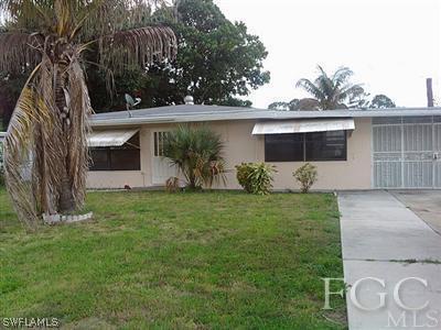 2120 Pineview Road Fort Myers, FL 33901 - Photo 1 of 1 front view of house with a yard
