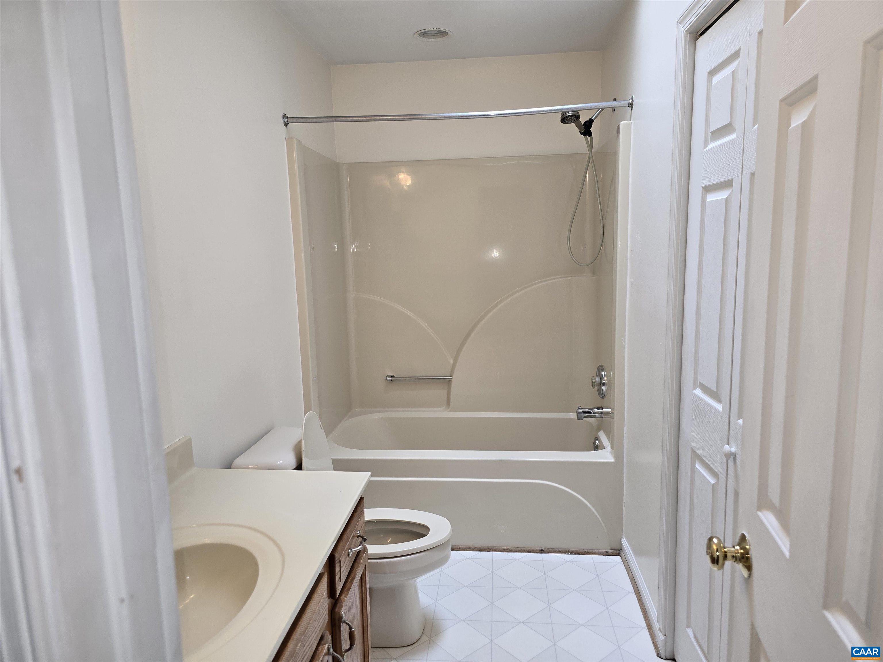259 Spring Oaks Lane Ruckersville, VA 22968 - Photo 28 of 30 a bathroom with a toilet and a bathtub