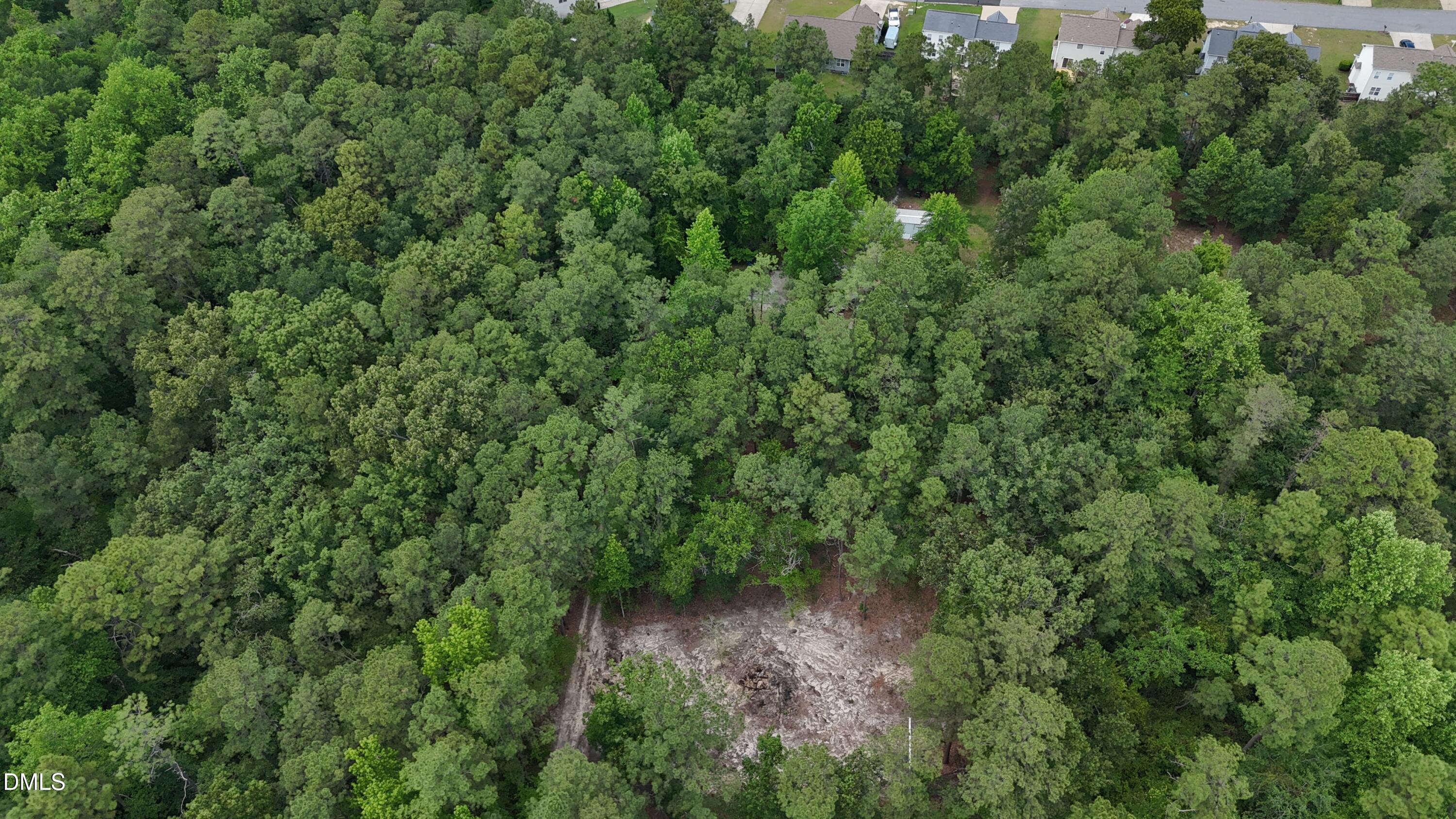 0 Elfman Drive Spring Lake, NC 28390 - Photo 11 of 40 an aerial view of residential house with outdoor space and trees all around