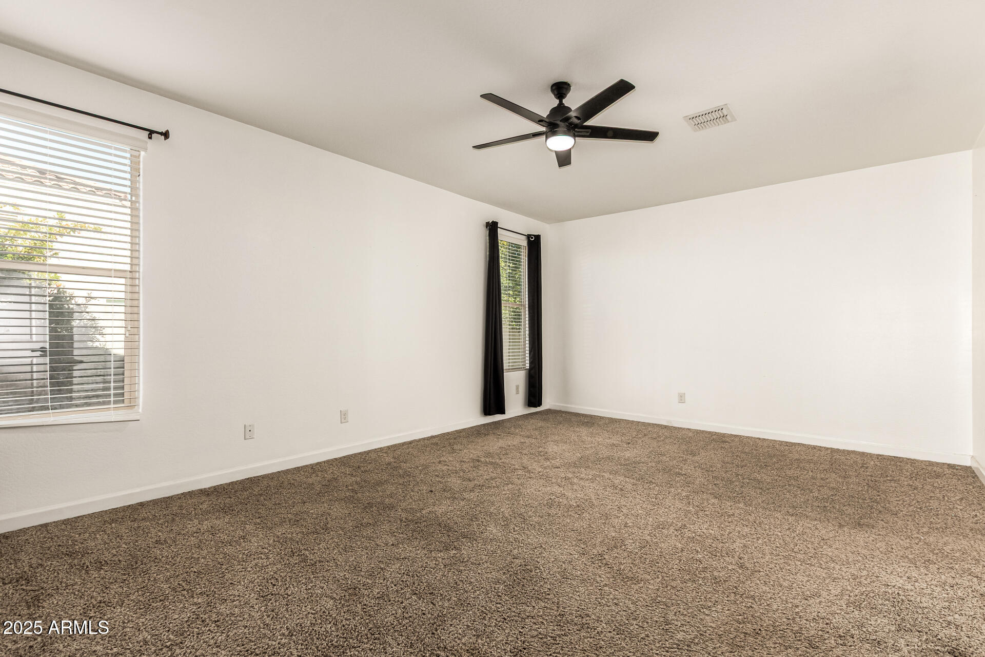 4170 West South Butte Road San Tan Valley, AZ 85144 - Photo 15 of 47 a view of a big room with carpet