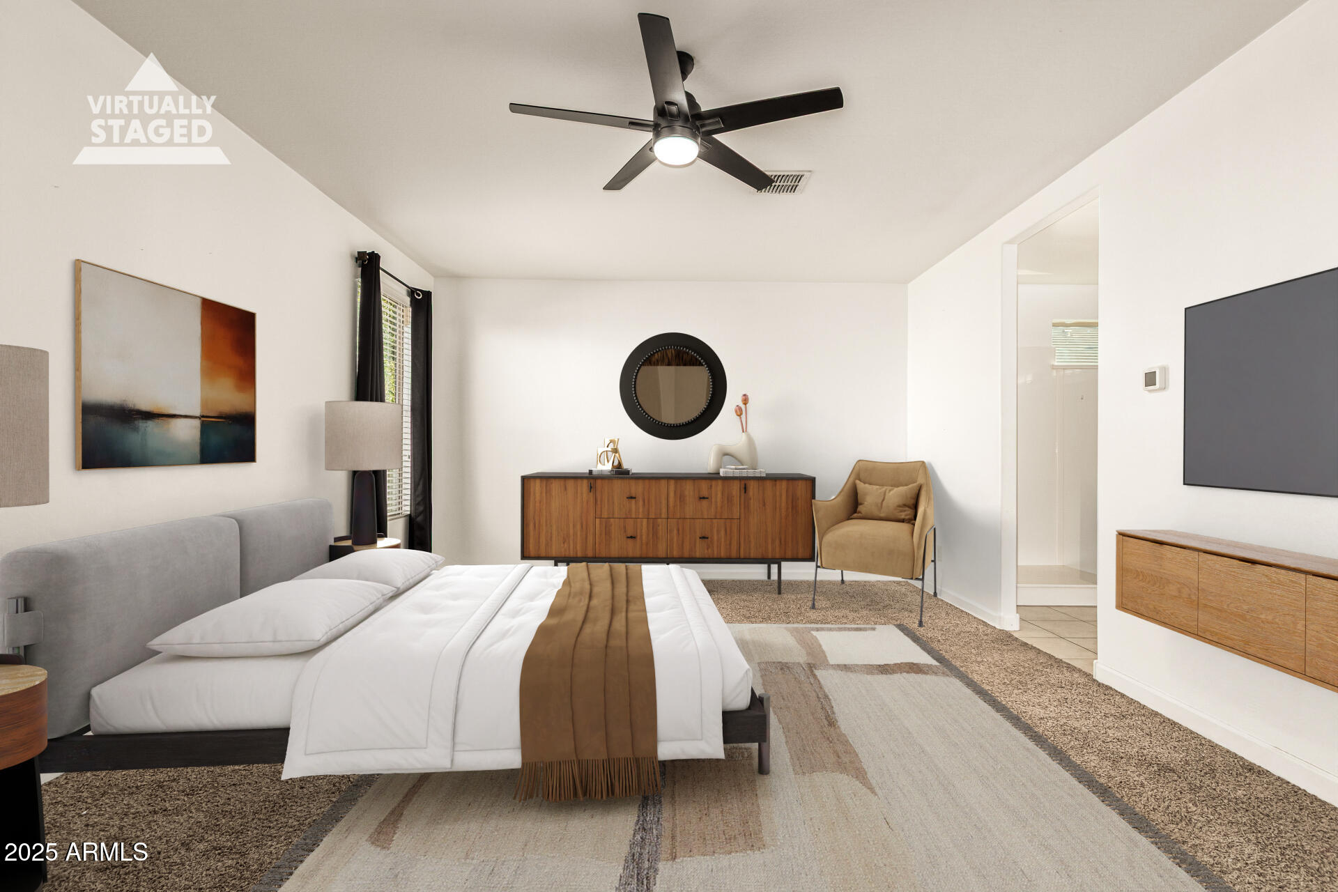 4170 West South Butte Road San Tan Valley, AZ 85144 - Photo 16 of 47 a bedroom with a large bed and a flat screen tv