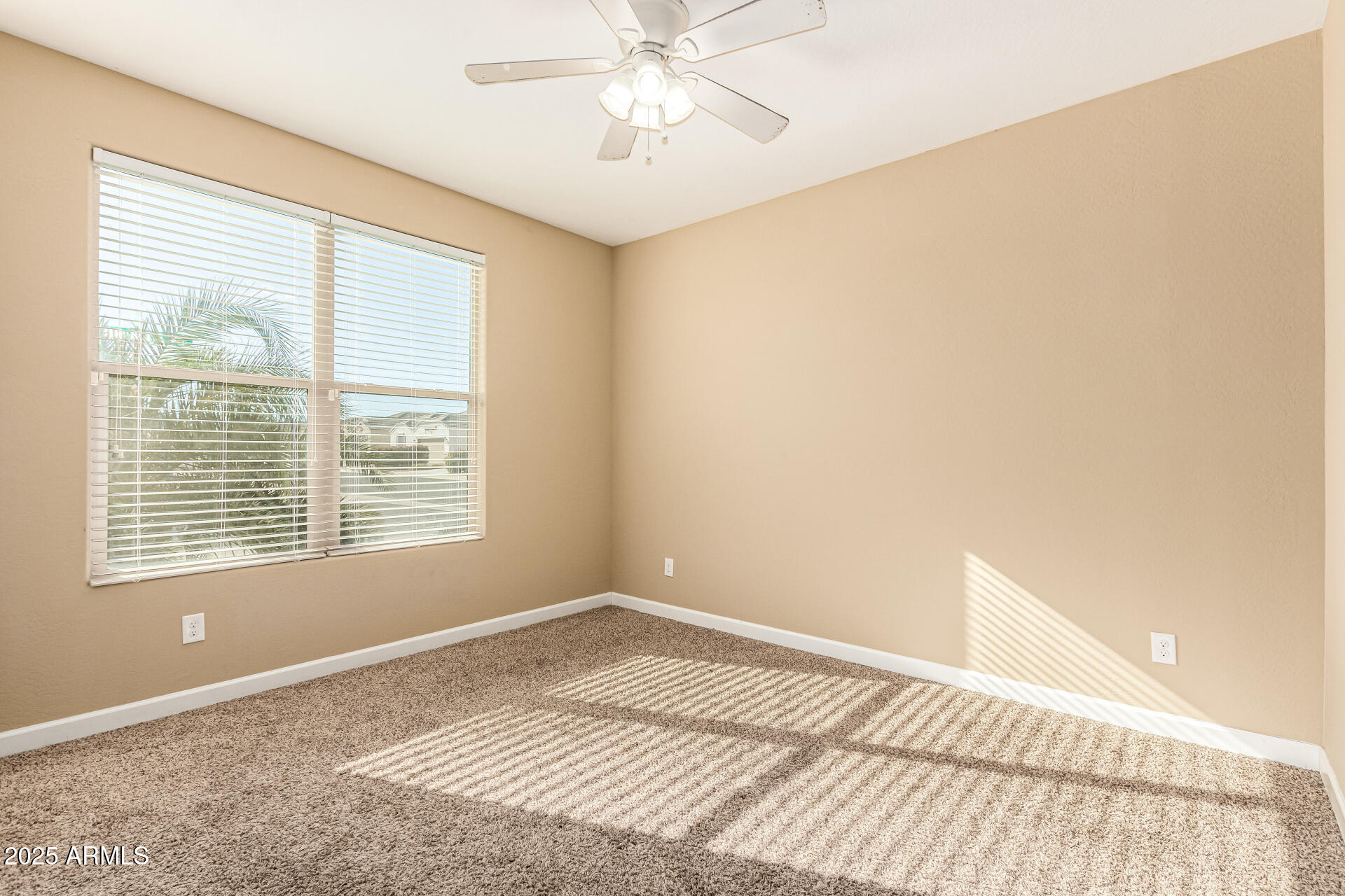 4170 West South Butte Road San Tan Valley, AZ 85144 - Photo 21 of 47 a view of an empty room with a window
