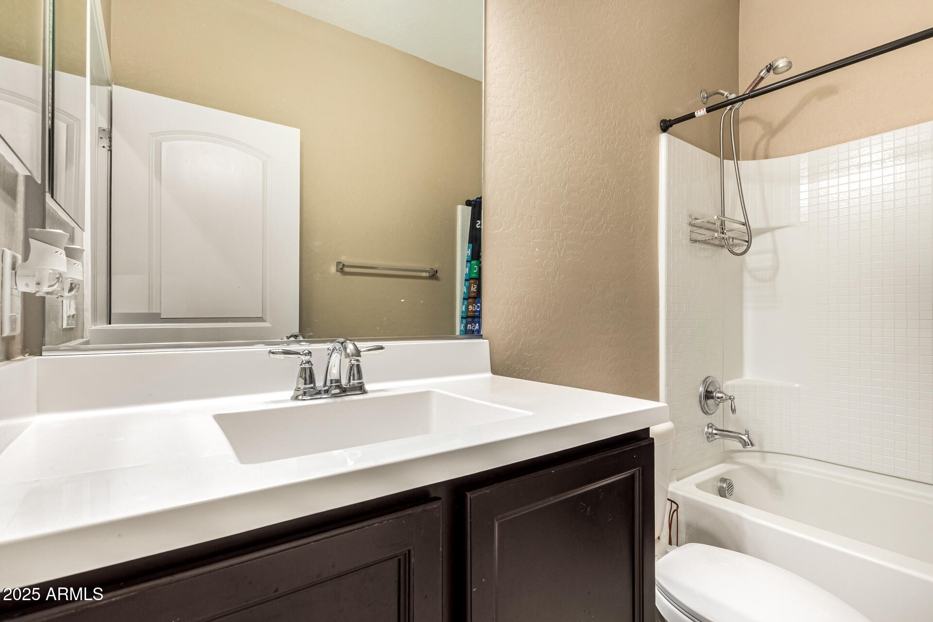 4170 West South Butte Road San Tan Valley, AZ 85144 - Photo 28 of 47 a bathroom with a sink a toilet and a bathtub