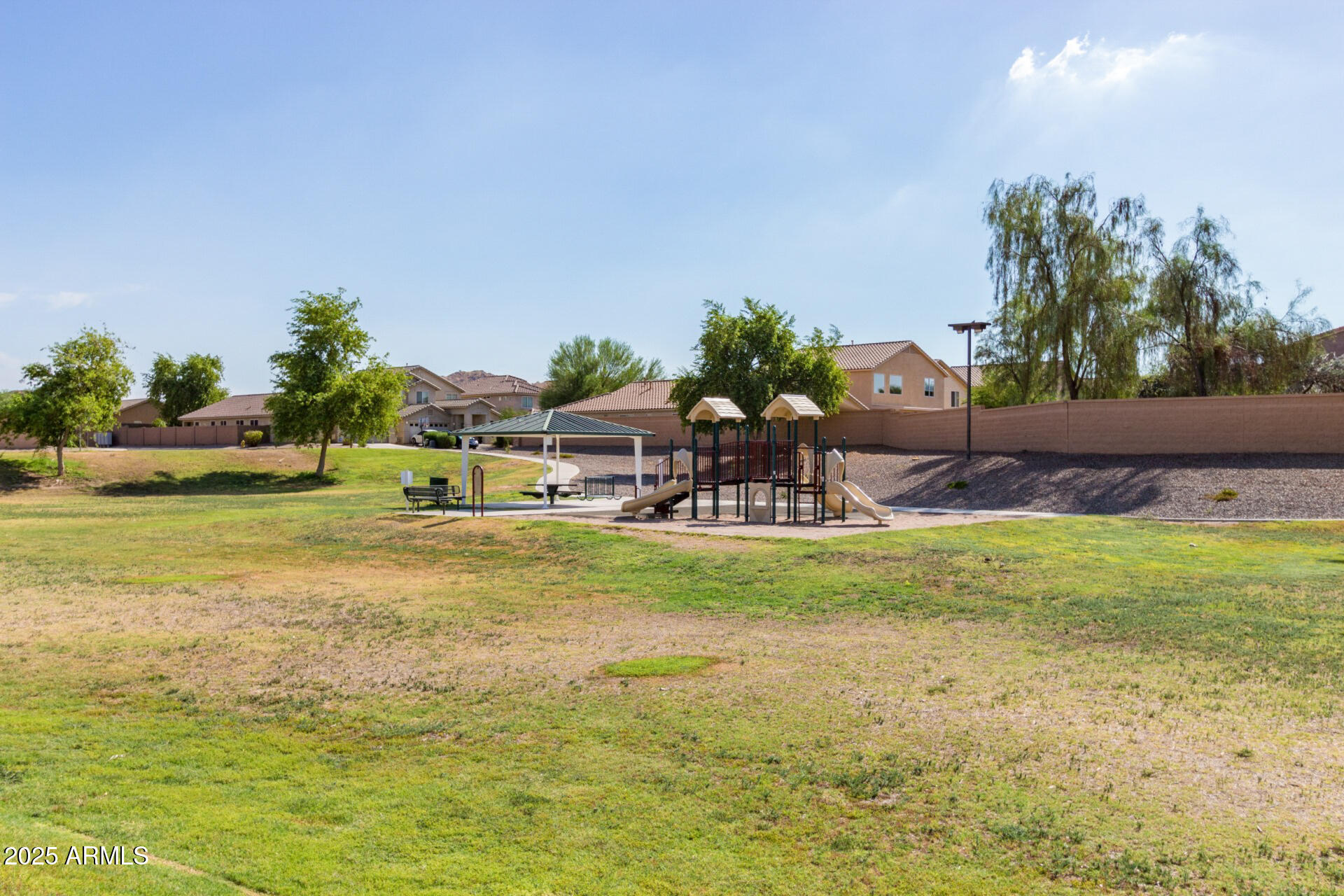 4170 West South Butte Road San Tan Valley, AZ 85144 - Photo 42 of 47 a view of yard with swimming pool and green space