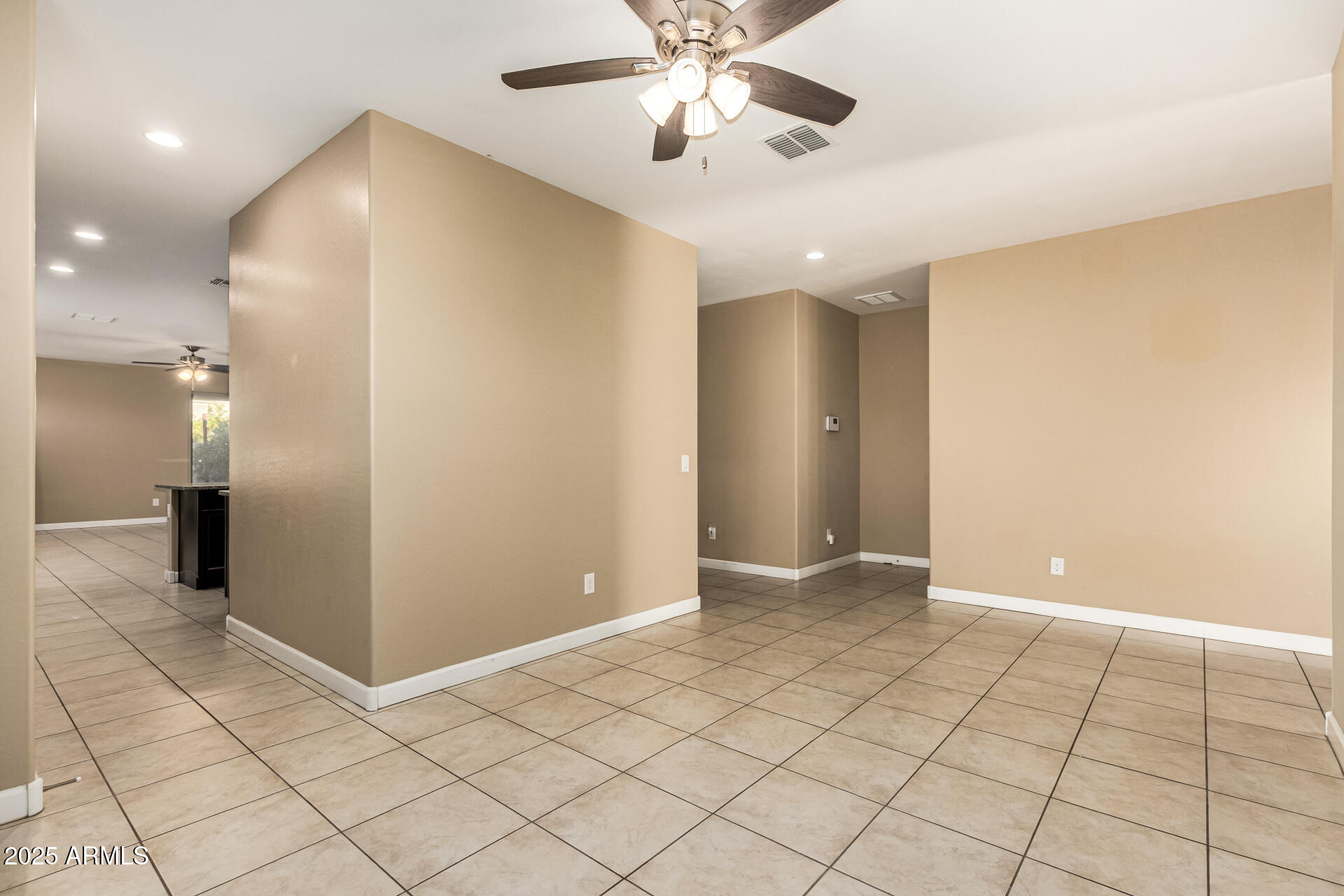 4170 West South Butte Road San Tan Valley, AZ 85144 - Photo 6 of 47 a view of an empty room and kitchen view
