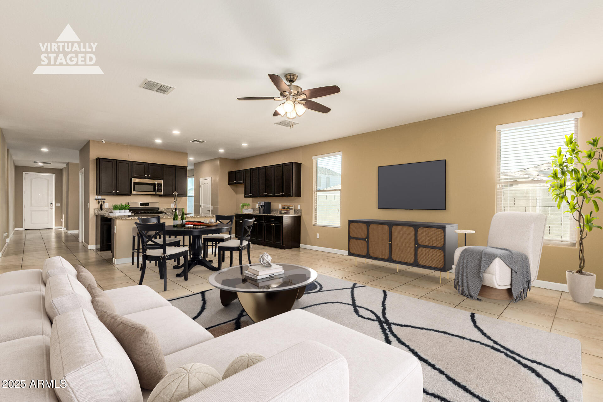 4170 West South Butte Road San Tan Valley, AZ 85144 - Photo 7 of 47 a living room with furniture and a flat screen tv