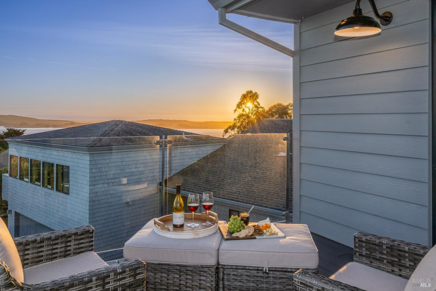 88 Cypress Loop Bodega Bay, CA 94923 - Photo 13 of 88 Enjoy a full spectrum of colors across the sky as the sun sets over views of Bodega Harbor, Bodega Bay, Bodega Head and the Pacific beyond. The deck was thoughtfully designed with semi-frameless glass railing system as to not obstruct from the stunning views.