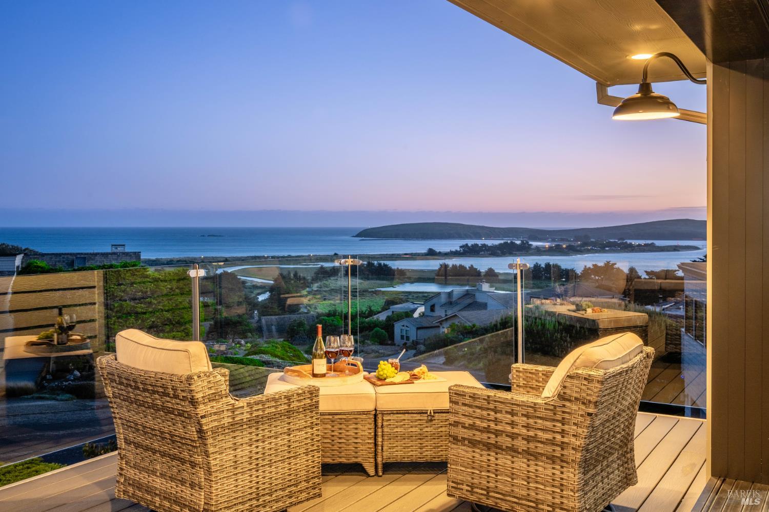 88 Cypress Loop Bodega Bay, CA 94923 - Photo 2 of 88 Enjoy a full spectrum of colors across the sky as the sun sets over views of Bodega Harbor, Bodega Bay, Bodega Head and the Pacific beyond. The deck was thoughtfully designed with semi-frameless glass railing system as to not obstruct from the stunning views.