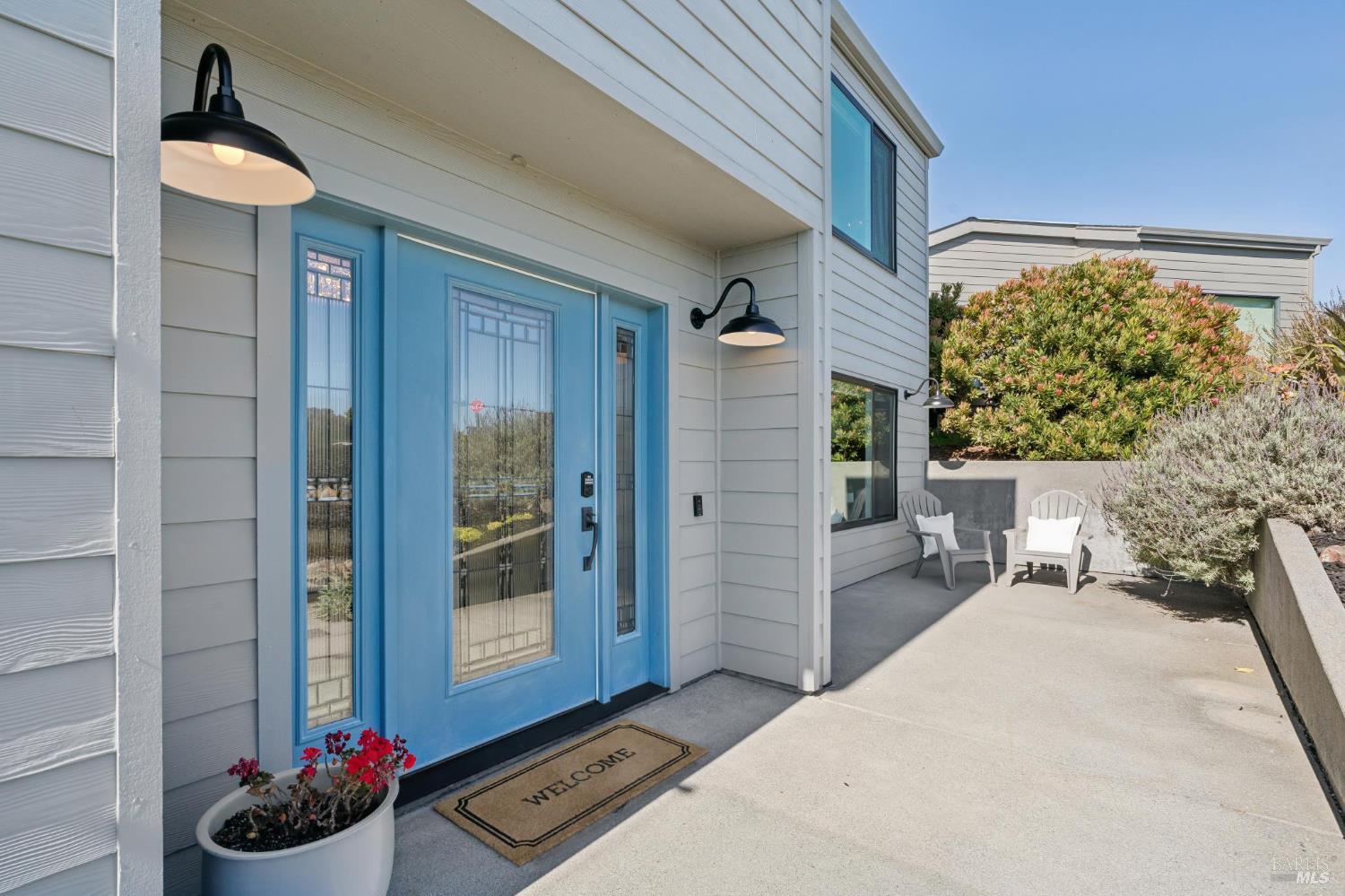 88 Cypress Loop Bodega Bay, CA 94923 - Photo 20 of 88 Beautiful Therma Tru front door designed for both style and privacy featuring decorative glass detailing. Private patio in the front offers ocean views.