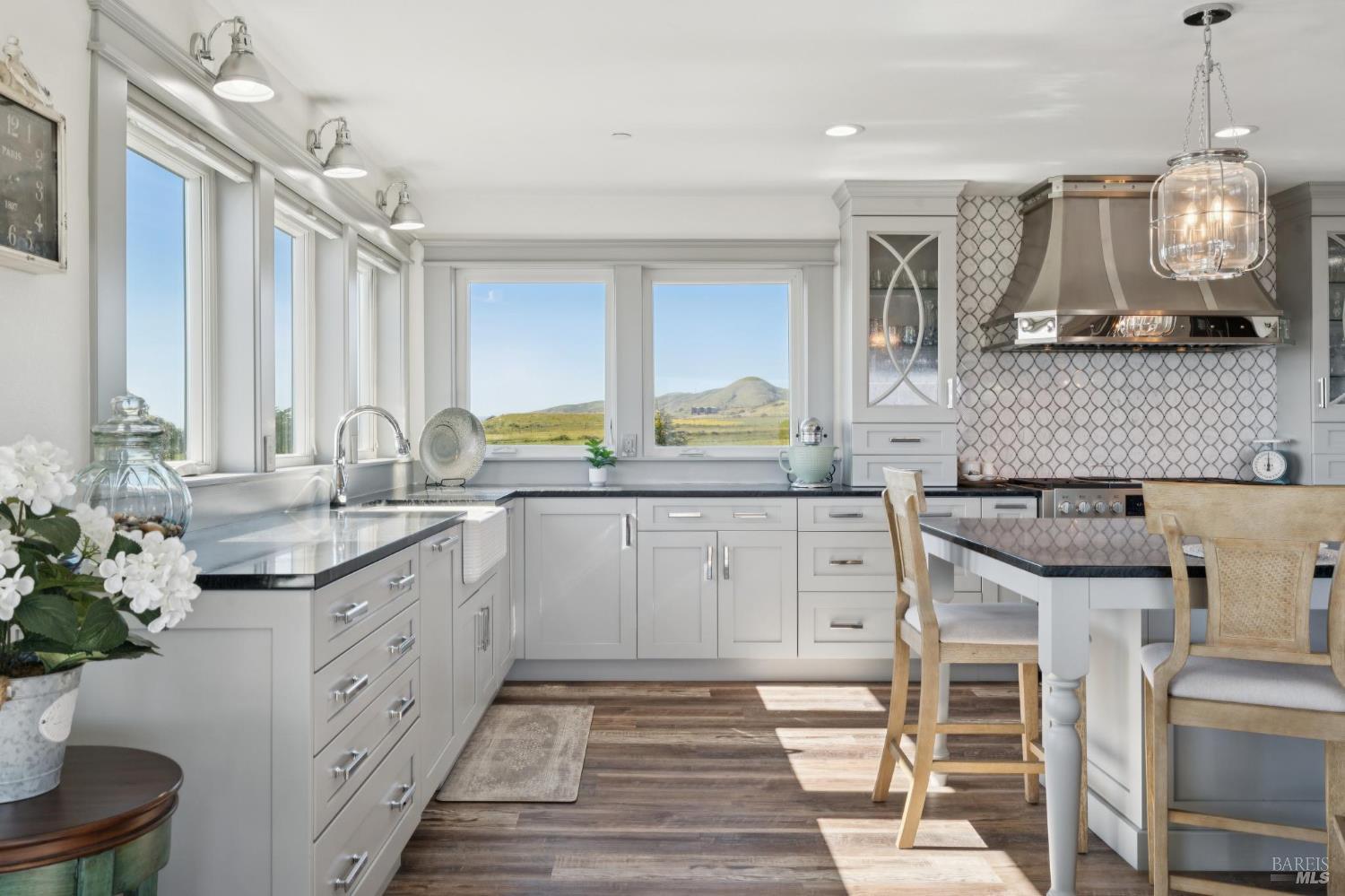 88 Cypress Loop Bodega Bay, CA 94923 - Photo 36 of 88 Spacious chef’s kitchen complete with Electrolux fridge, oversized island, large walk-in pantry, dual ovens, dark soapstone counters, touch-activated faucets, motored window shades and a beautiful backsplash above the Fulgor 6-burner range.