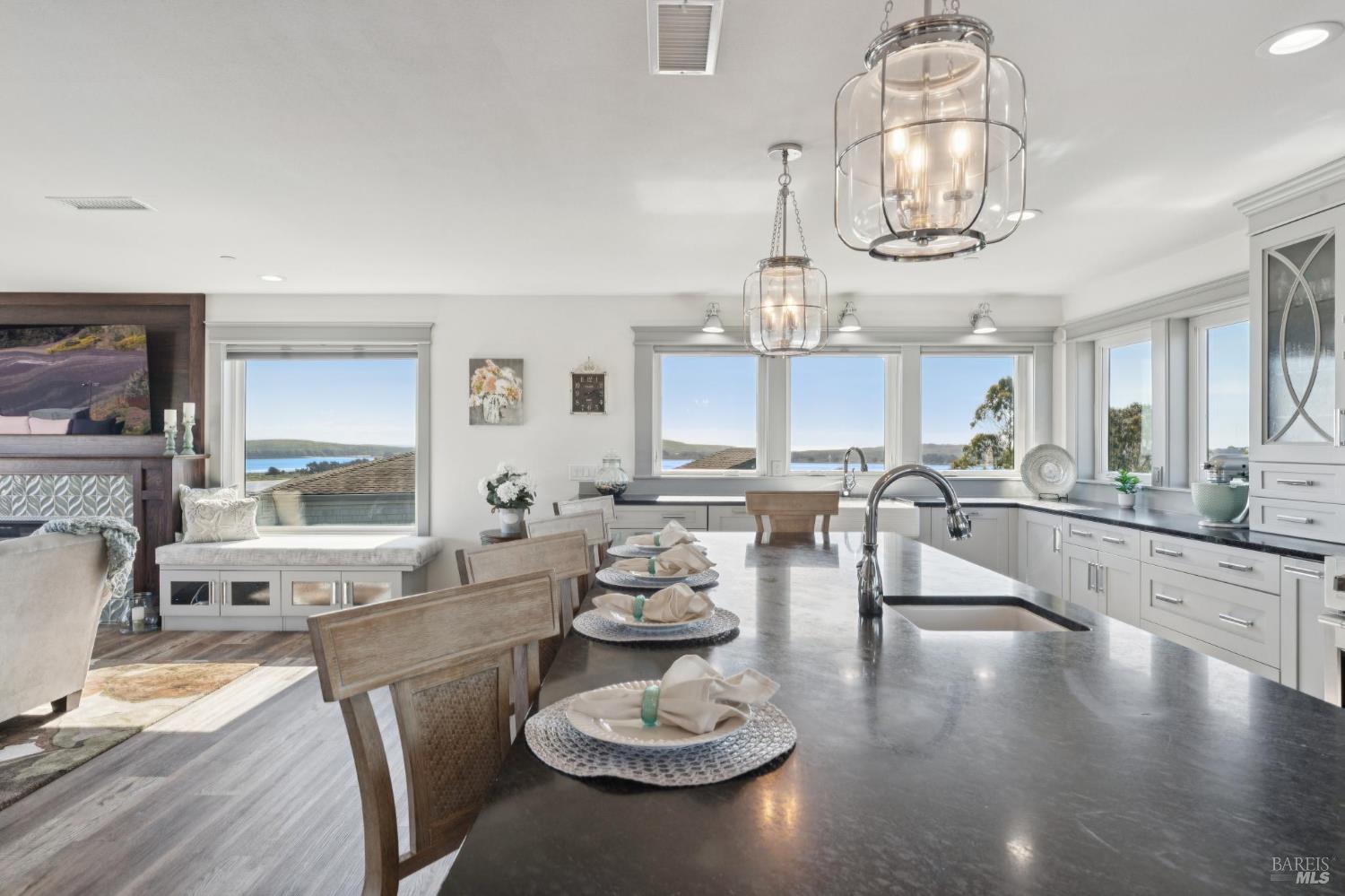 88 Cypress Loop Bodega Bay, CA 94923 - Photo 48 of 88 Spacious chef’s kitchen complete with Electrolux fridge, oversized island, large walk-in pantry, dual ovens, dark soapstone counters, touch-activated faucets, motored window shades and a beautiful backsplash above the Fulgor 6-burner range.