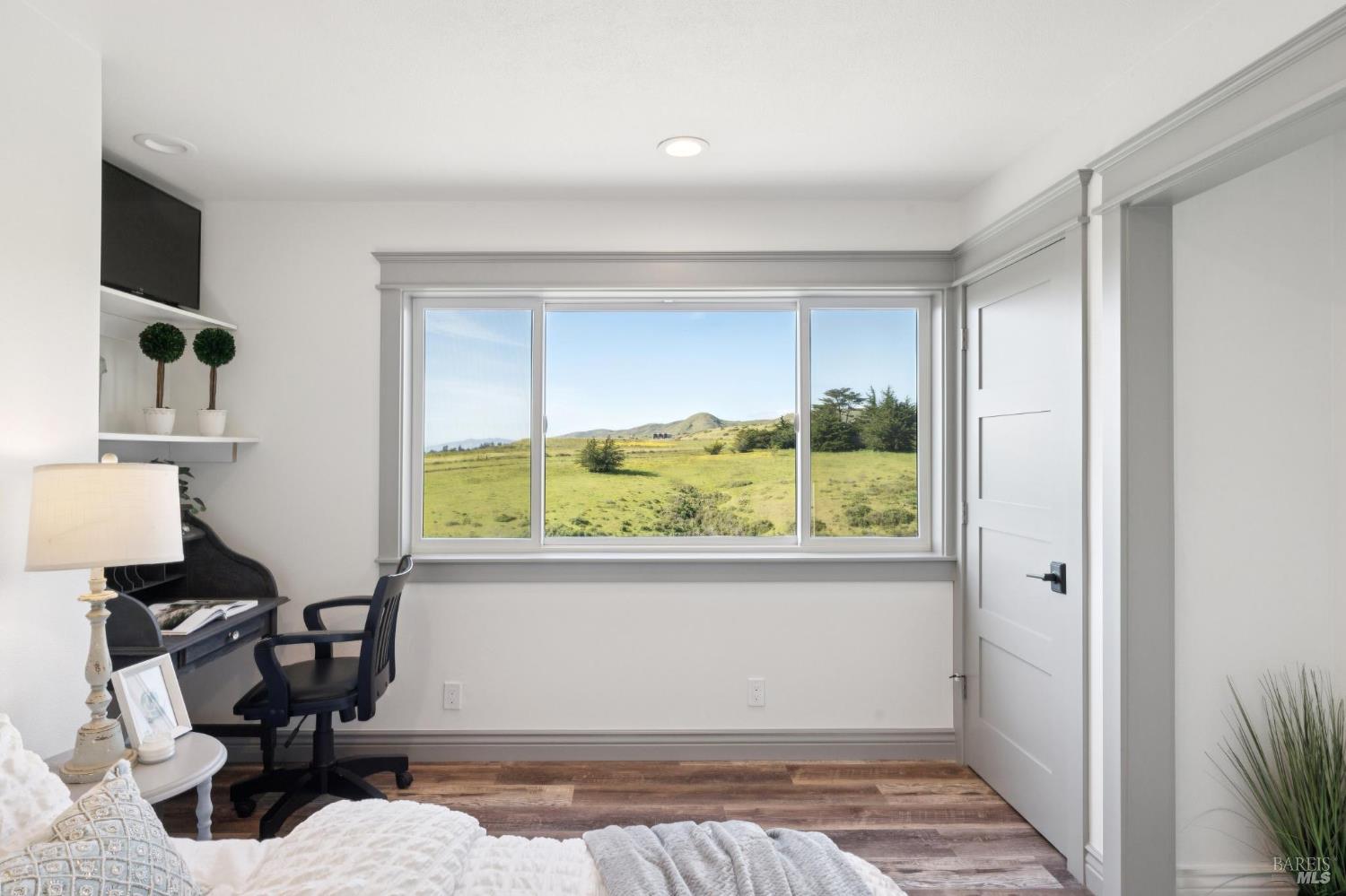 88 Cypress Loop Bodega Bay, CA 94923 - Photo 59 of 88 Upstairs guest bedroom located near the elevator offers recessed lighting and beautiful hillside views.