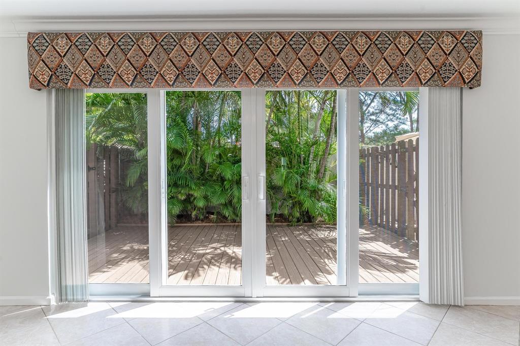 801 Southeast 16th Court, Unit 11 Fort Lauderdale, FL 33316 - Photo 15 of 49 Sliding Doors to Sunfilled Private Patio