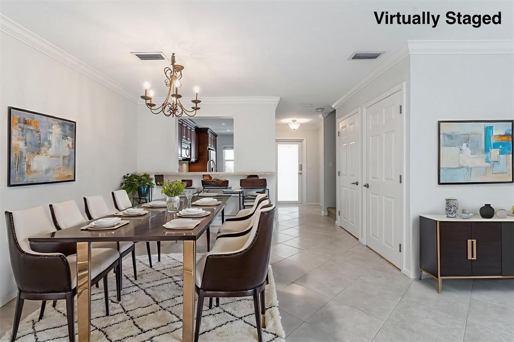 801 Southeast 16th Court, Unit 11 Fort Lauderdale, FL 33316 - Photo 18 of 49 a view of a dining room with furniture