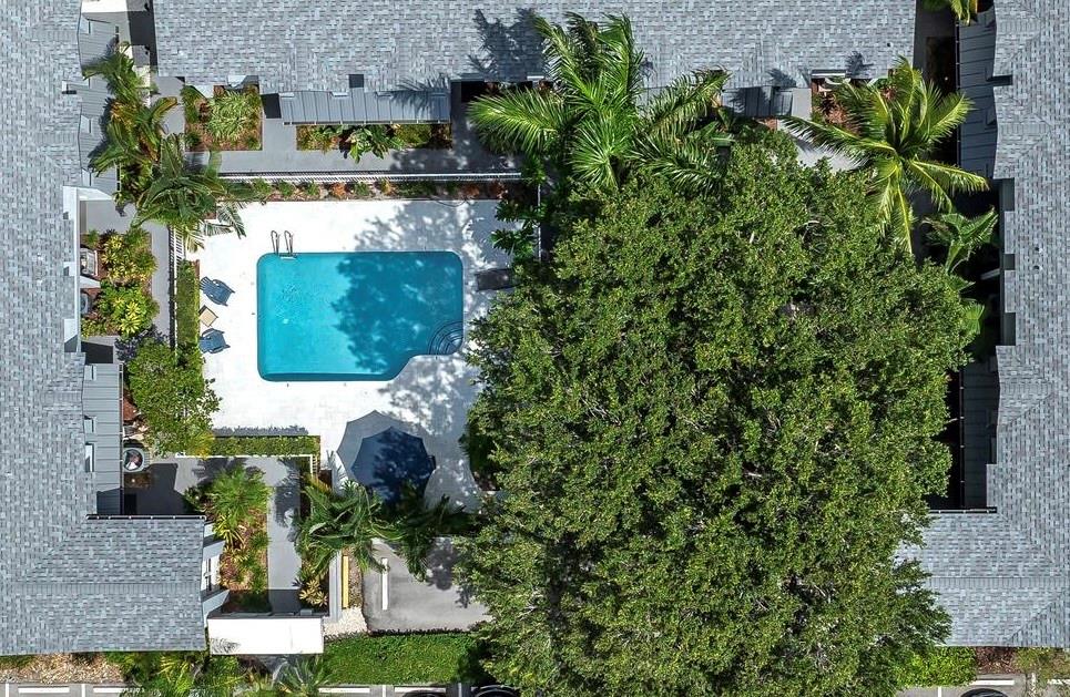 801 Southeast 16th Court, Unit 11 Fort Lauderdale, FL 33316 - Photo 2 of 49 an aerial view of a house with a yard swimming pool and outdoor seating