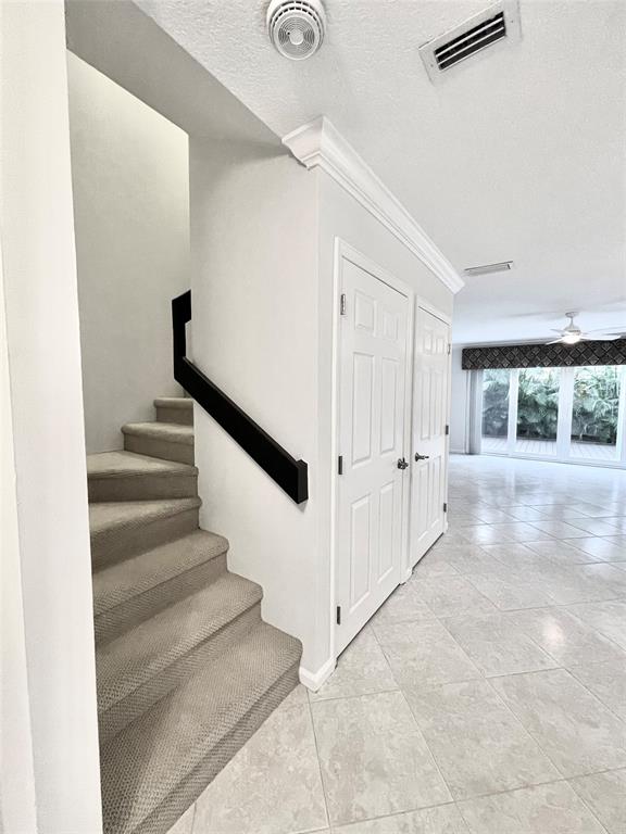 801 Southeast 16th Court, Unit 11 Fort Lauderdale, FL 33316 - Photo 30 of 49 a view of entryway and hall with wooden floor