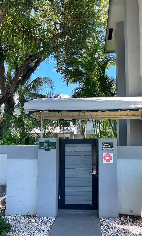 801 Southeast 16th Court, Unit 11 Fort Lauderdale, FL 33316 - Photo 4 of 49 Gated Entry to Townhouse
