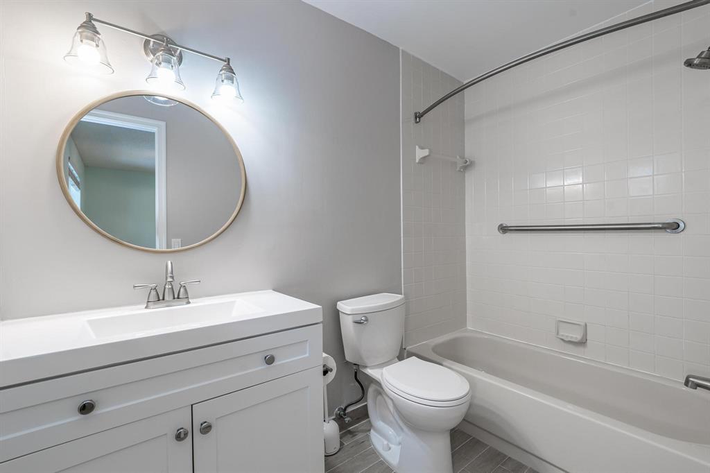 801 Southeast 16th Court, Unit 11 Fort Lauderdale, FL 33316 - Photo 41 of 49 a bathroom with a sink toilet and a mirror