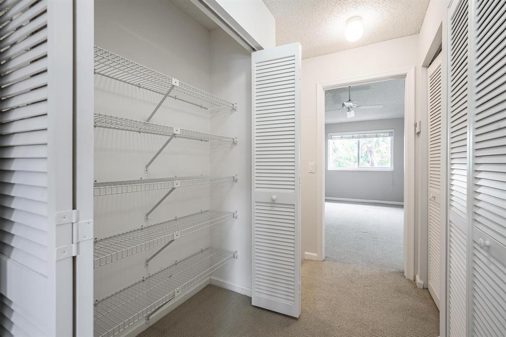 801 Southeast 16th Court, Unit 11 Fort Lauderdale, FL 33316 - Photo 44 of 49 Upstairs Hall Large Storage Closet
