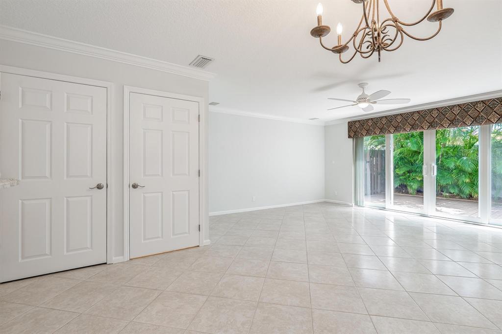 801 Southeast 16th Court, Unit 11 Fort Lauderdale, FL 33316 - Photo 9 of 49 a view of an empty room with a window